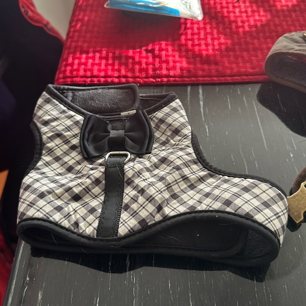 5 dog sweaters and harnesses:  1 small, 2 medium and 2 large.